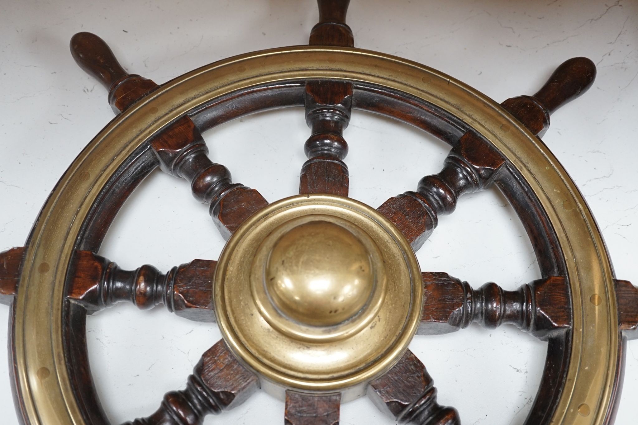 A 19th century mahogany and brass mounted ship's wheel, 60cm